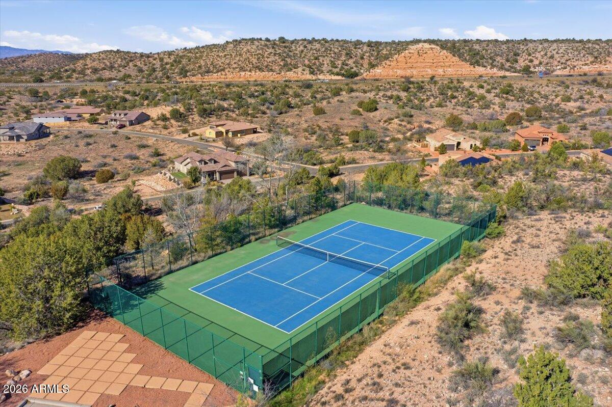 6150 North Stratford Court Rimrock, AZ 86335 - Photo 57 of 60 an aerial view of a tennis ground and a yard