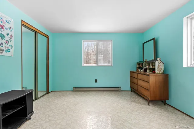 a room with furniture and window