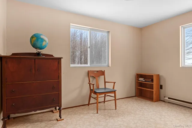 a view of a livingroom with furniture