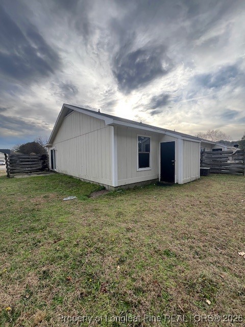 164 Eulon Loop, Unit A & B Raeford, NC 28376 - Photo 12 of 12 a view of a house with a garden