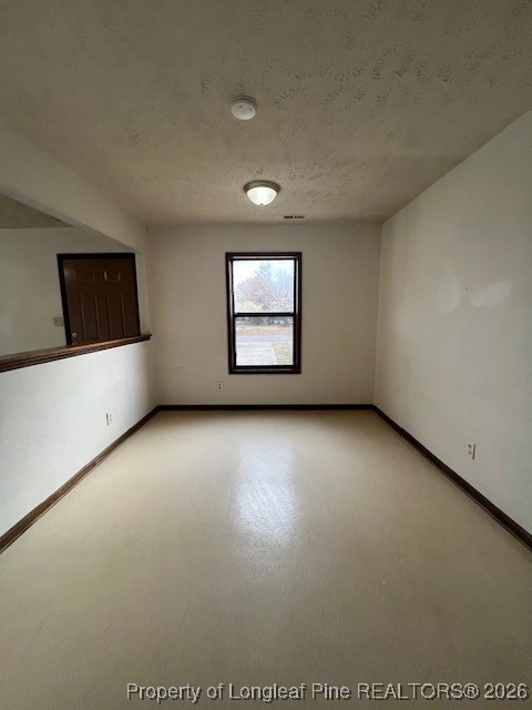 164 Eulon Loop, Unit A & B Raeford, NC 28376 - Photo 5 of 12 an empty room with windows