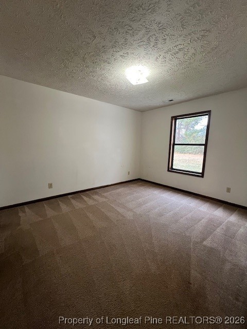 164 Eulon Loop, Unit A & B Raeford, NC 28376 - Photo 9 of 12 an empty room with windows