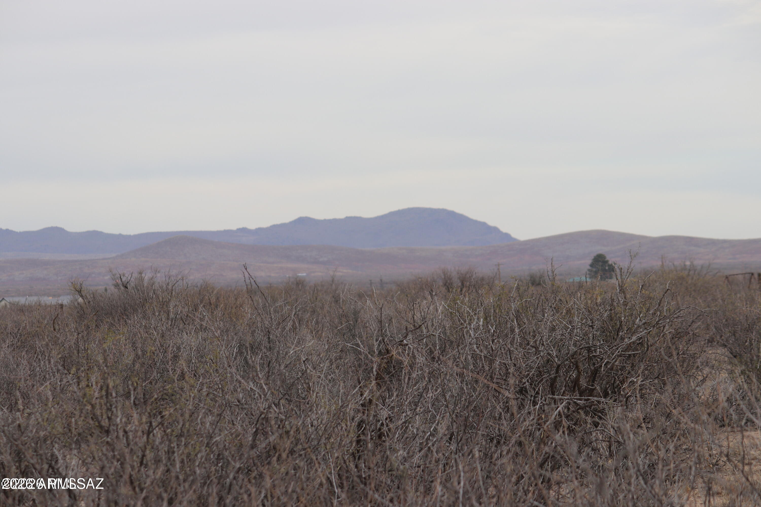 Tbd West Packing Plant Road, Unit 24 Willcox, AZ 85643 - Photo 4 of 5 a view of a town with mountains in the background