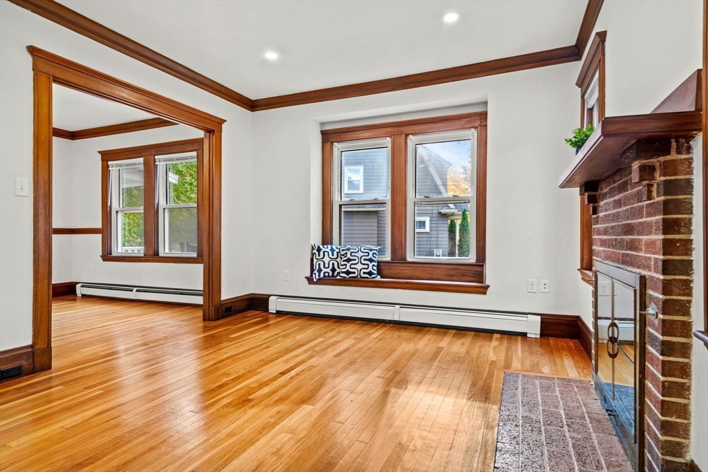 24 Vaille Avenue Lexington, MA 02421 - Photo 11 of 41 a view of an empty room with glass door and door