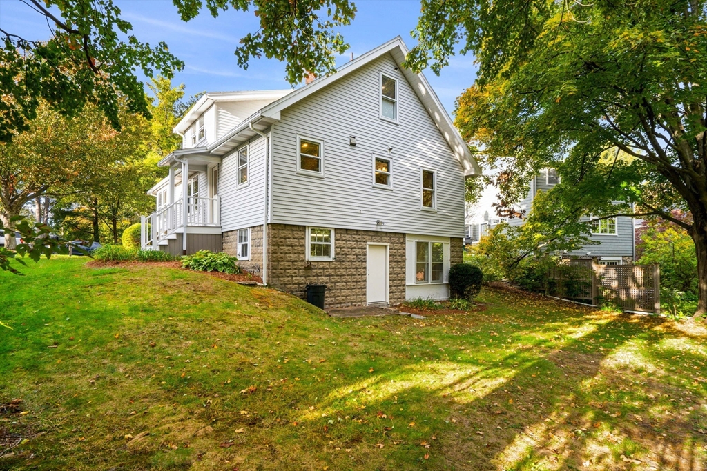 24 Vaille Avenue Lexington, MA 02421 - Photo 3 of 41 a view of a house with a yard