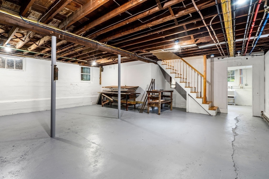24 Vaille Avenue Lexington, MA 02421 - Photo 33 of 41 a view of an empty room with white walls