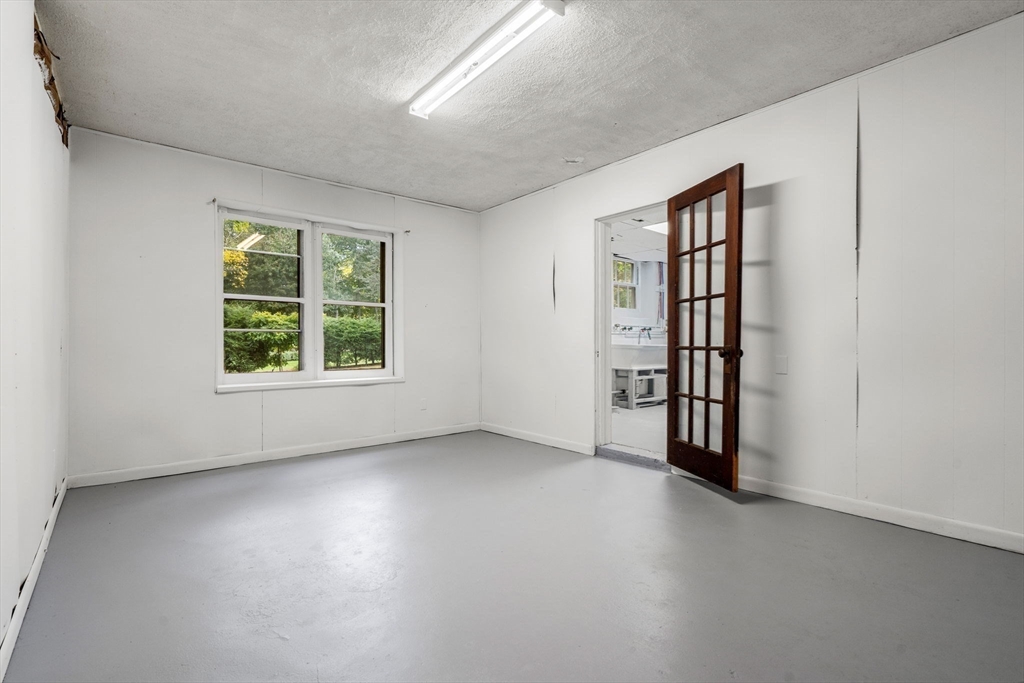 24 Vaille Avenue Lexington, MA 02421 - Photo 36 of 41 an empty room with windows