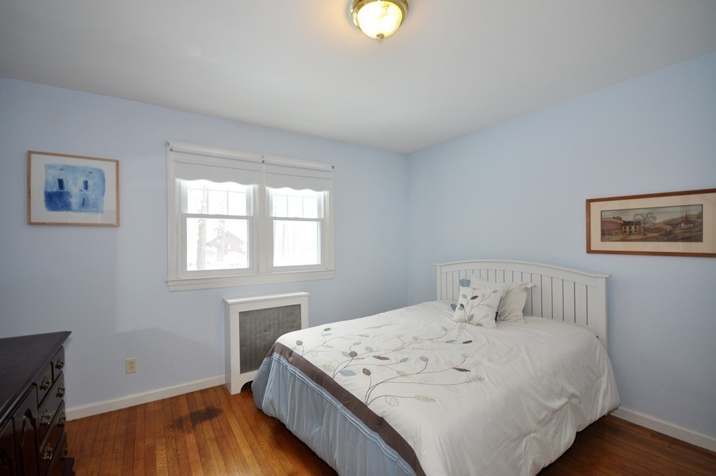 33 Warner Road Bolton, MA 01740 - Photo 17 of 23 a bedroom with a bed and a window