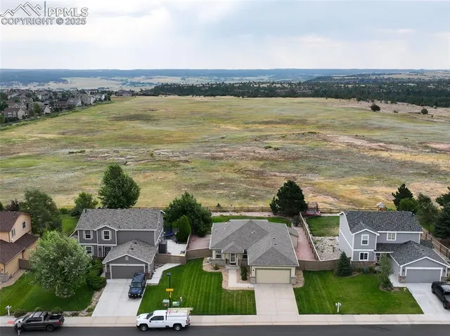 a view of a city with an ocean view