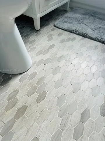 a view of a dry room with wooden floor