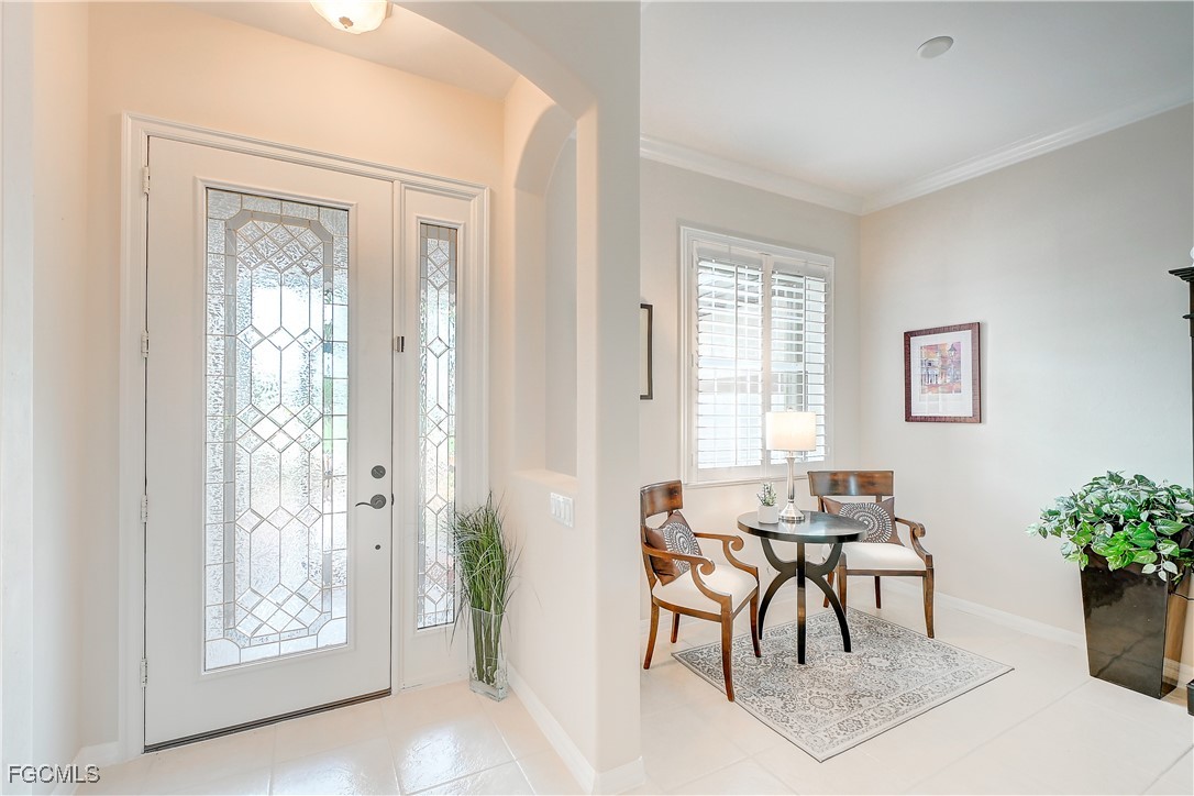12910 Timber Ridge Drive Fort Myers, FL 33913 - Photo 4 of 37 a workspace with furniture and window