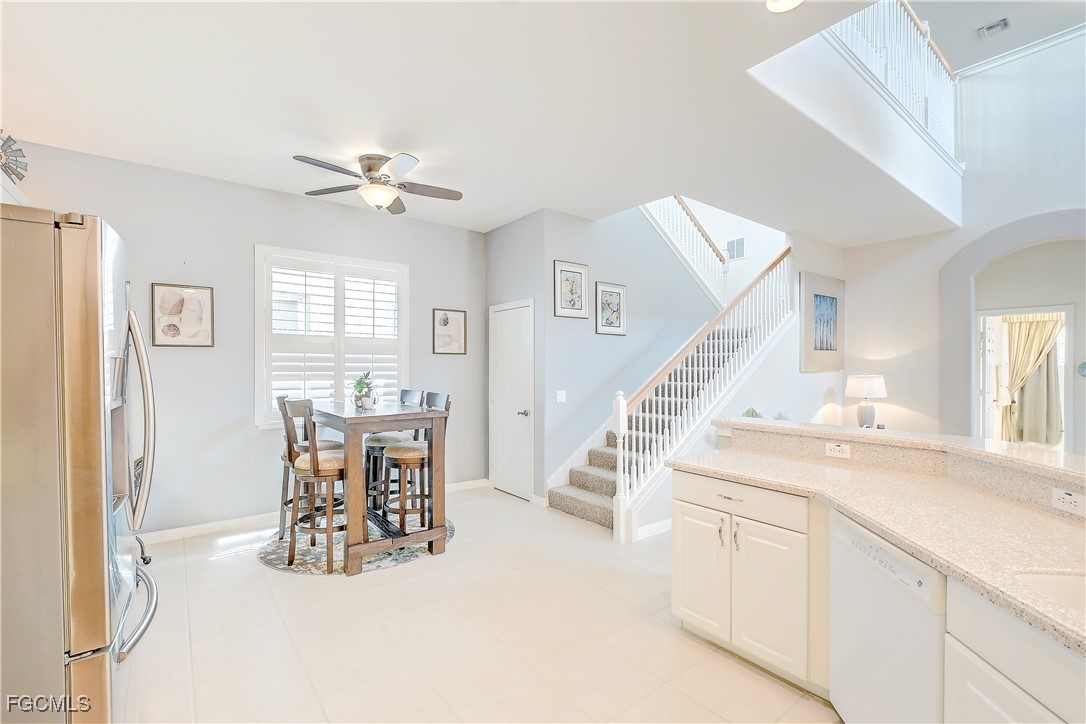 12910 Timber Ridge Drive Fort Myers, FL 33913 - Photo 10 of 37 a view of living room with furniture and a chandelier