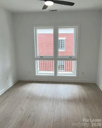 a bathroom with a bathtub and a toilet