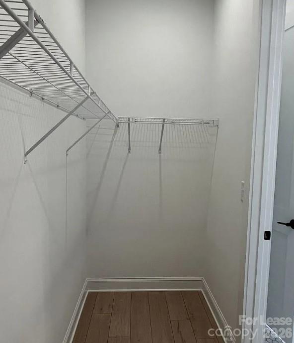 19546 Greentree Way, Unit 203 Cornelius, NC 28031 - Photo 20 of 22 a view of a room with racks on the wall