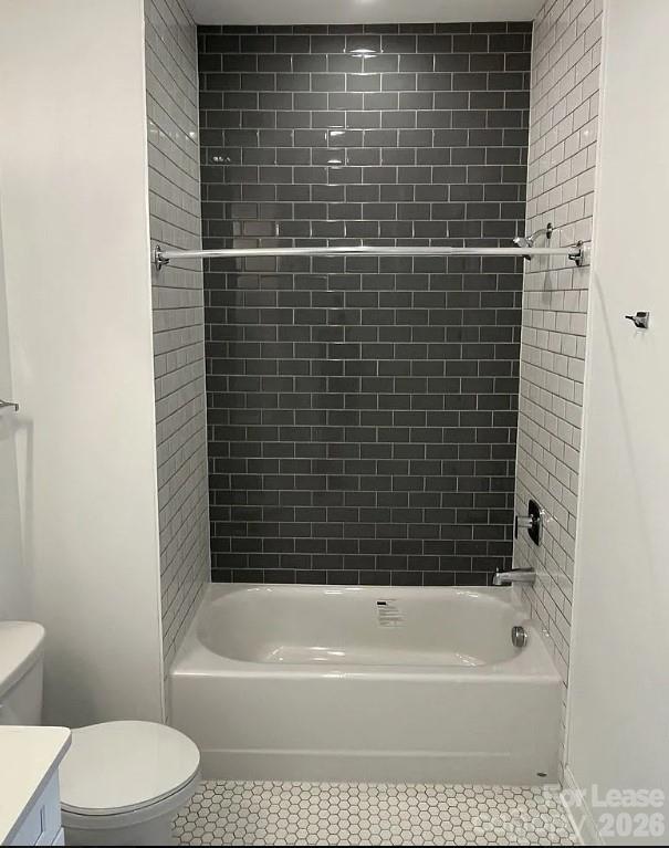 19546 Greentree Way, Unit 203 Cornelius, NC 28031 - Photo 21 of 22 a bathroom with a bathtub and a toilet