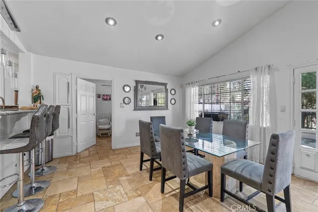 a view of a dining room with furniture