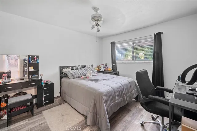 a bed room with a bed furniture and a window