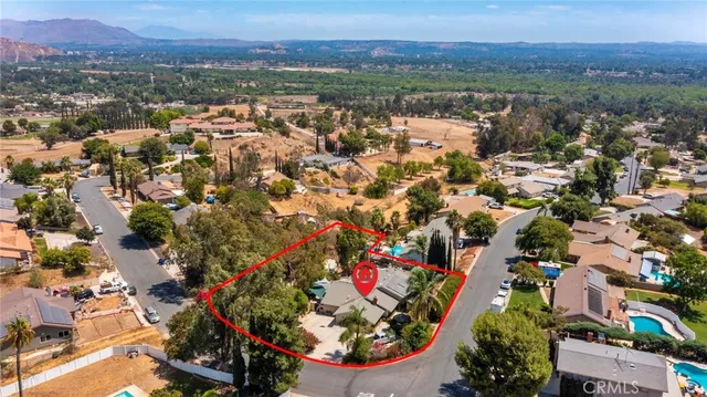 an aerial view of residential house with outdoor space