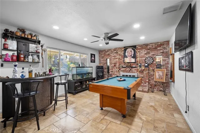 a room with lots of tables and chairs