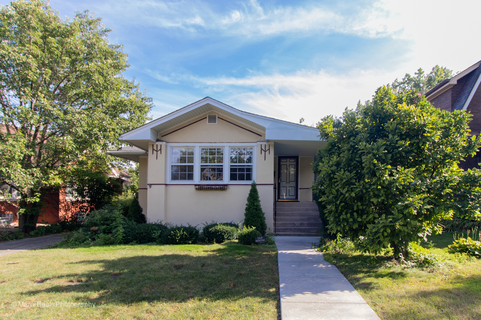 269 Shenstone Road Riverside, IL 60546 - Photo 2 of 25 a front view of a house with a yard