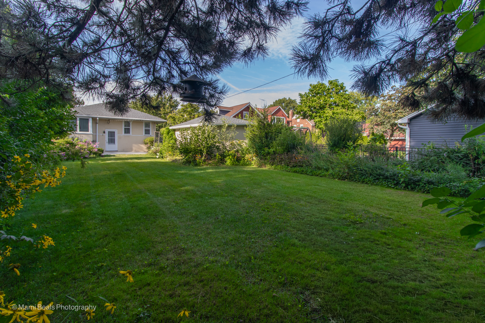 269 Shenstone Road Riverside, IL 60546 - Photo 23 of 25 a front view of a house with a garden