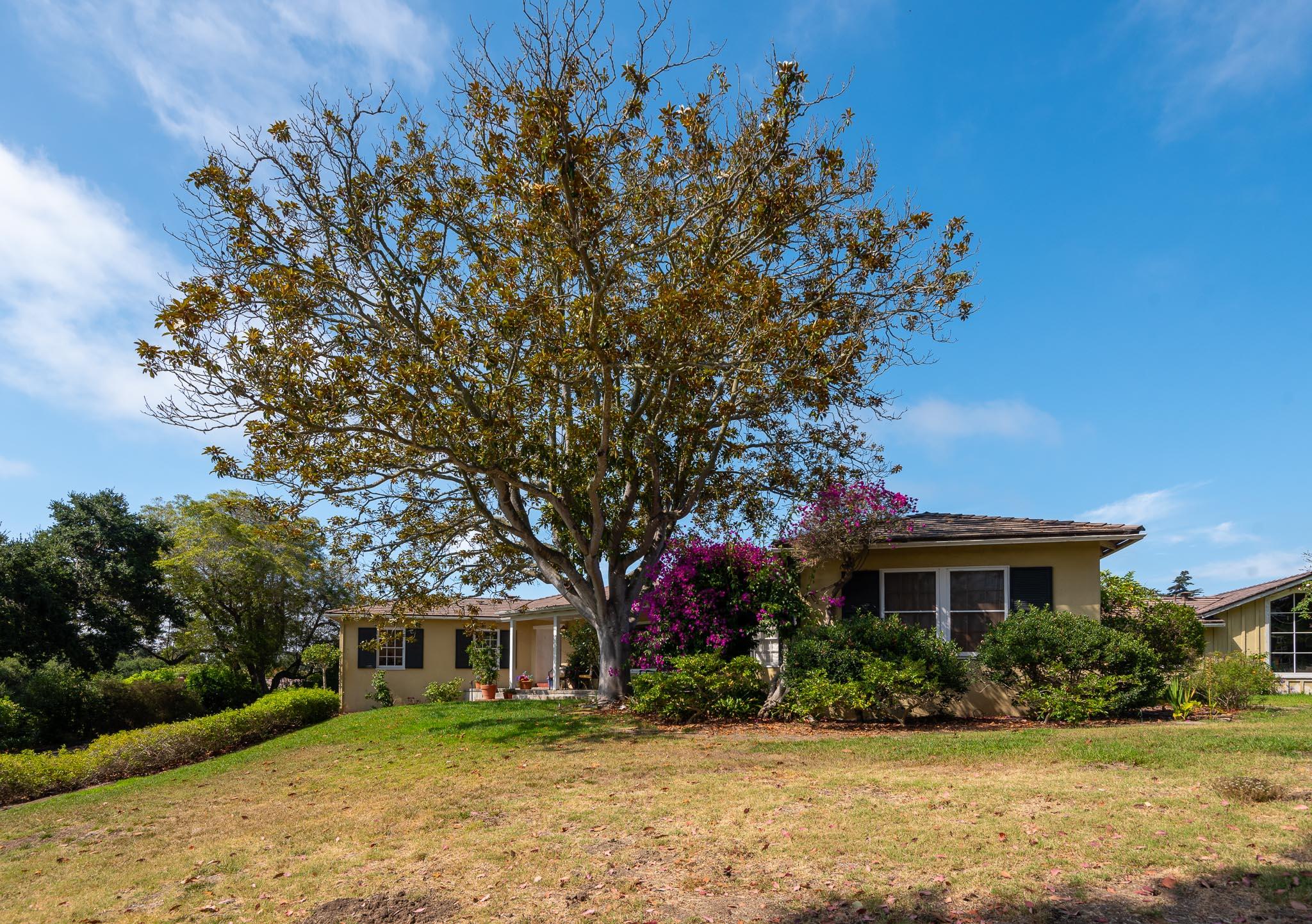 895 Via Hierba Santa Barbara, CA 93110 - Photo 1 of 24 a front view of a house with a yard