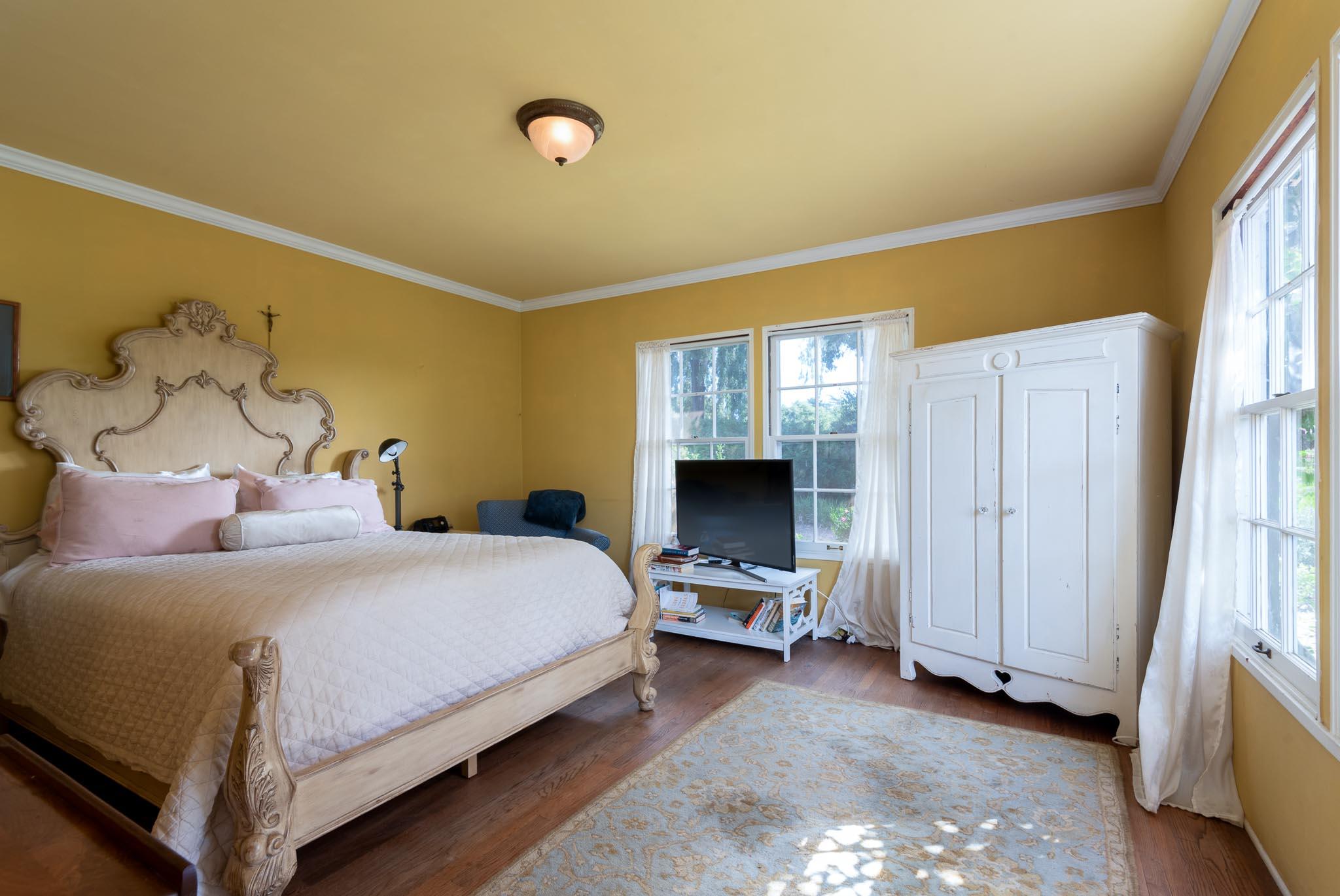 895 Via Hierba Santa Barbara, CA 93110 - Photo 11 of 24 a bedroom with a bed and a cabinets
