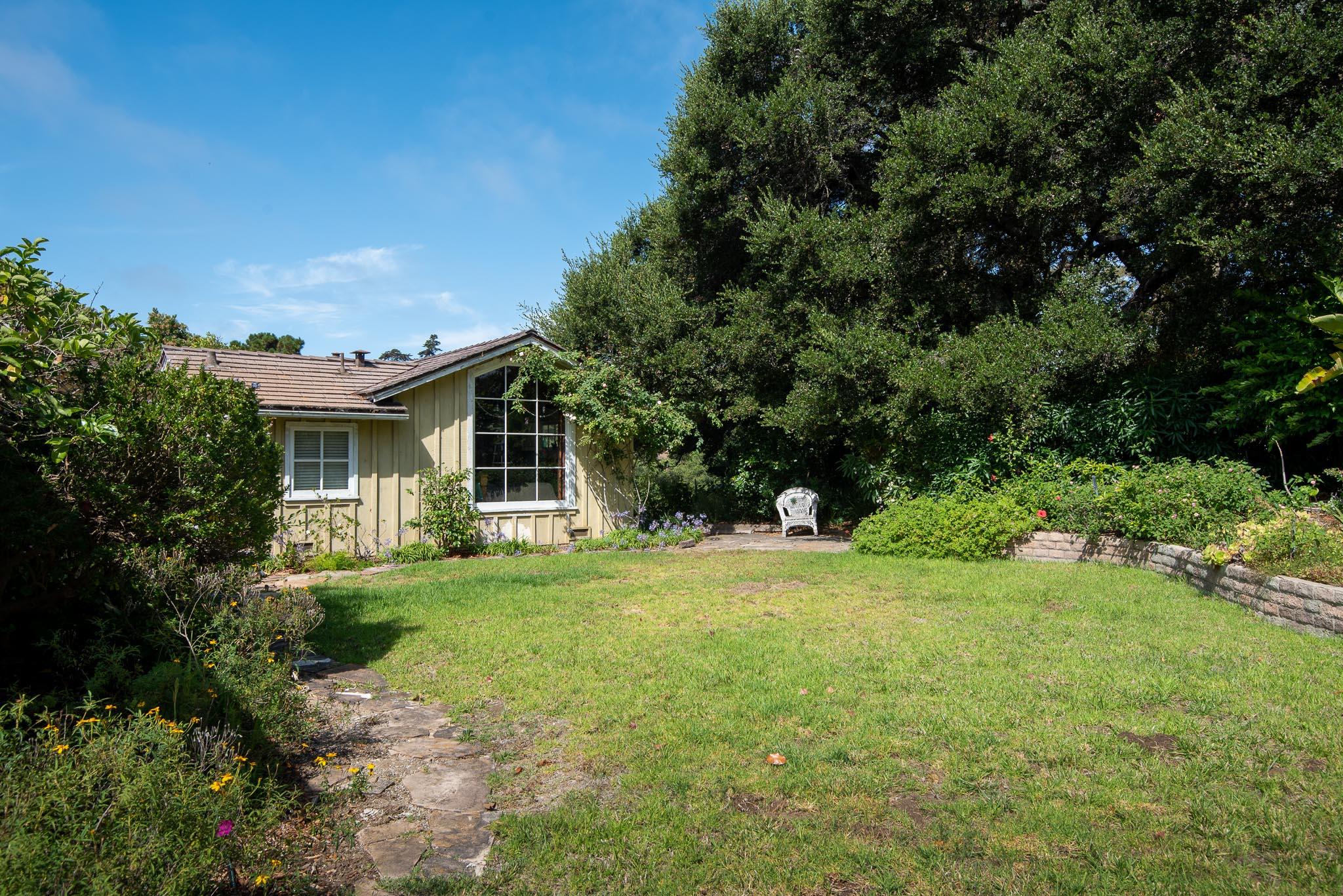 895 Via Hierba Santa Barbara, CA 93110 - Photo 16 of 24 a front view of a house with a yard