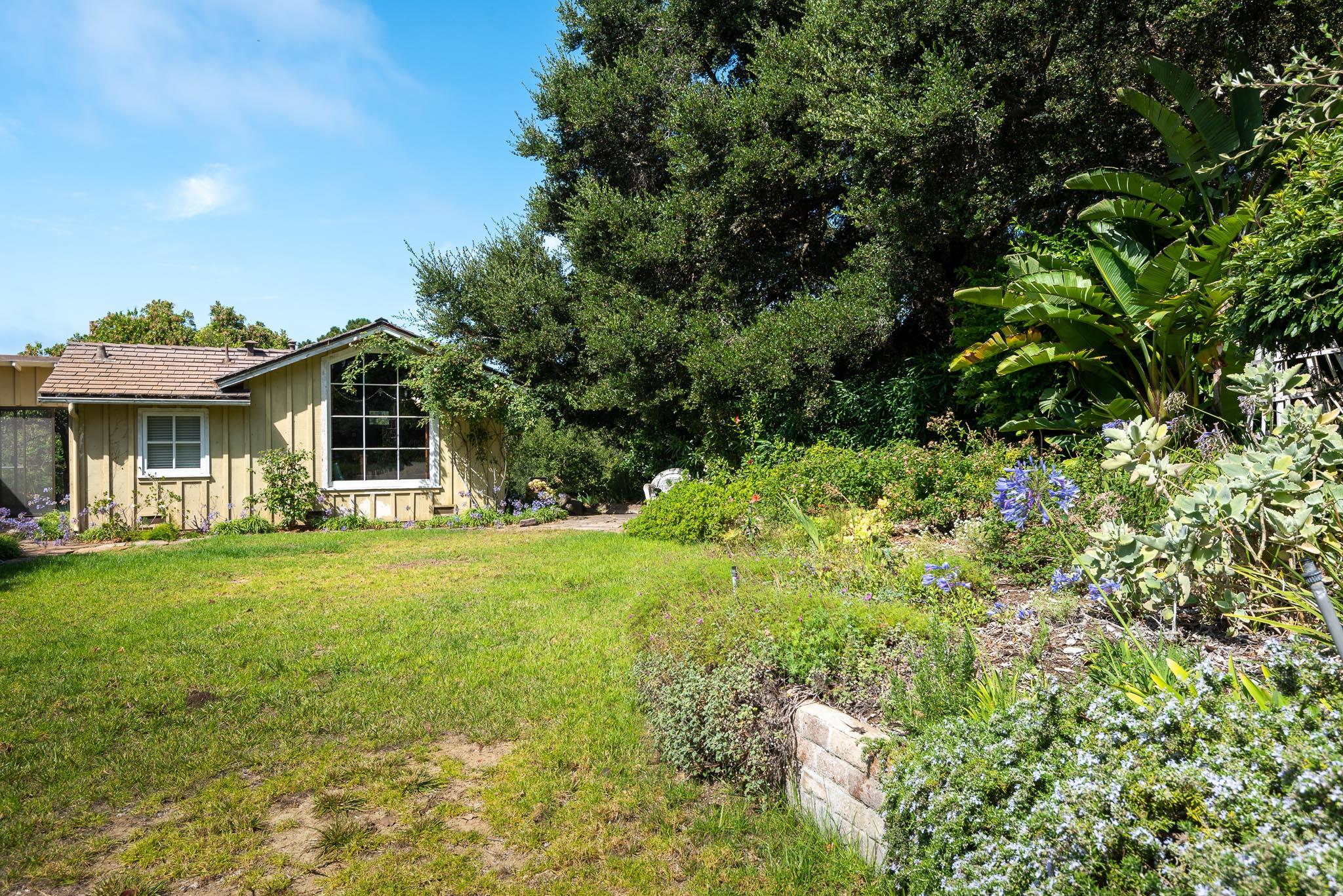 895 Via Hierba Santa Barbara, CA 93110 - Photo 17 of 24 a front view of a house with a garden
