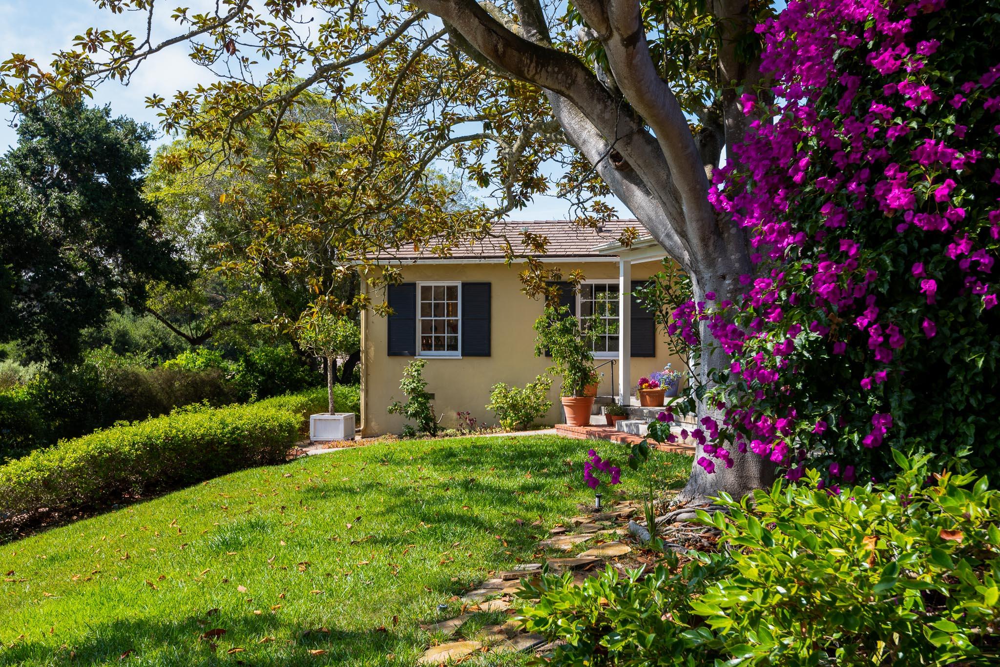 895 Via Hierba Santa Barbara, CA 93110 - Photo 18 of 24 a view of a house with a big yard and large tree