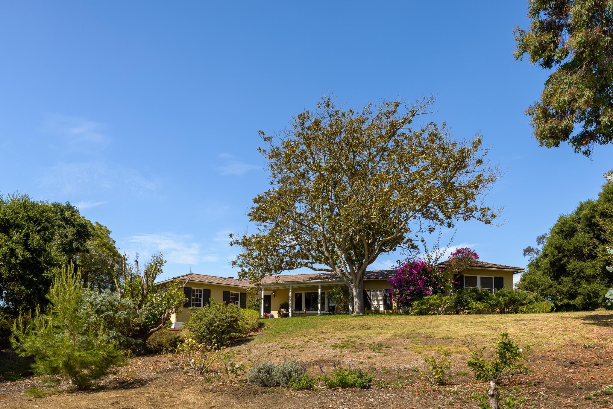 895 Via Hierba Santa Barbara, CA 93110 - Photo 2 of 24 a front view of a house with a yard