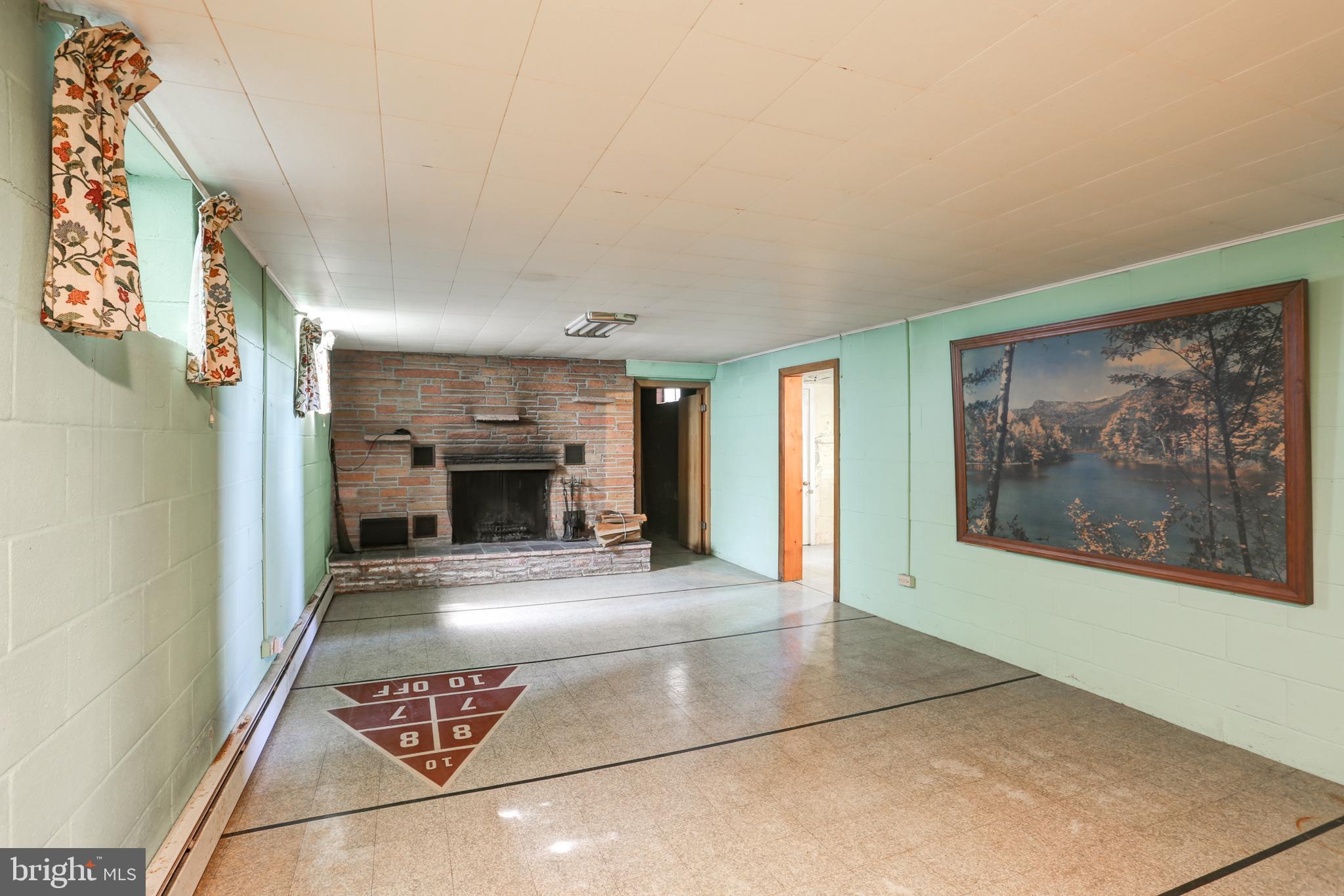 50 Foreman Road Elizabethtown, PA 17022 - Photo 28 of 36 Lower level family room with fireplace