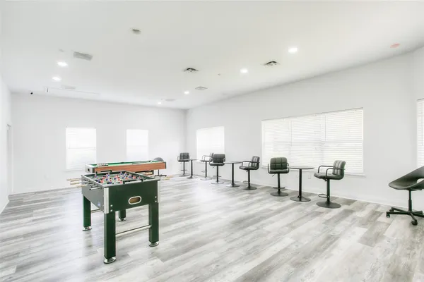 a room with lots of gym equipment
