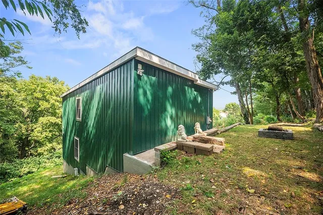a view of a balcony with wooden floor