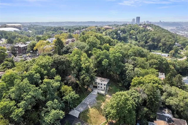 an aerial view of a city with lots of residential buildings