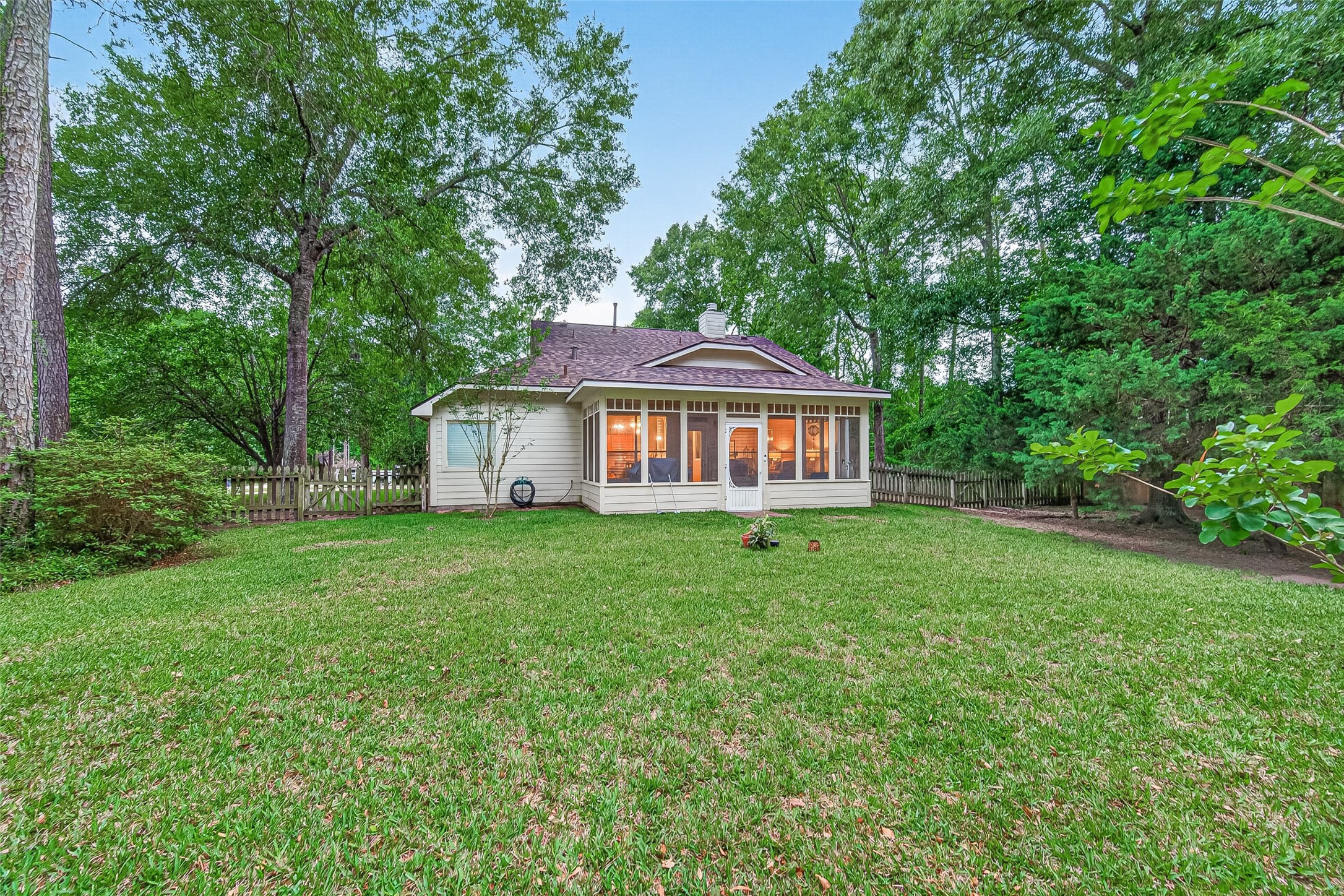 12455 West Summerlin Conroe, TX 77302 - Photo 26 of 31 a front view of a house with a yard