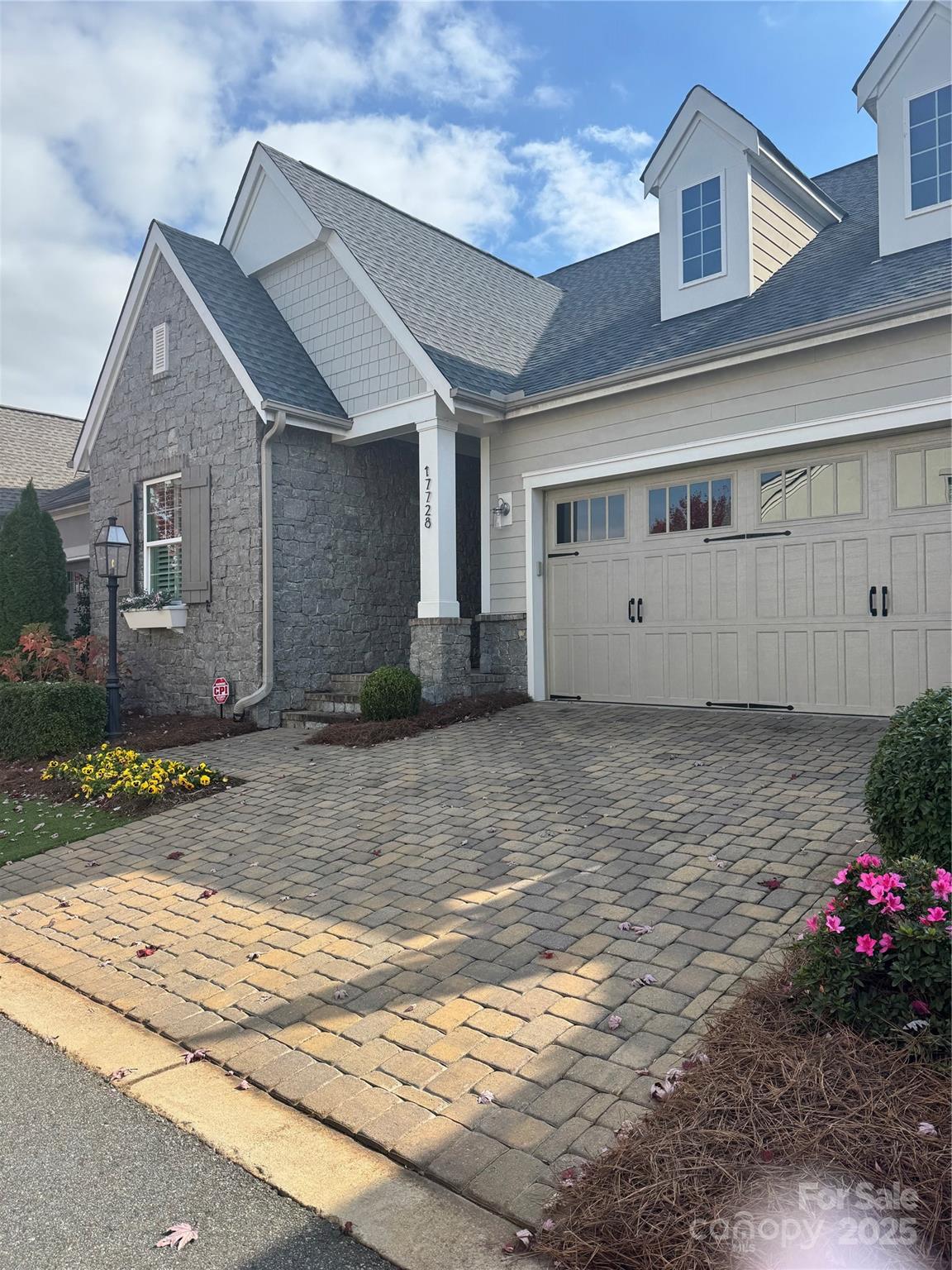 17728 Jetton Green Loop Cornelius, NC 28031 - Photo 2 of 7 a front view of a house with a yard