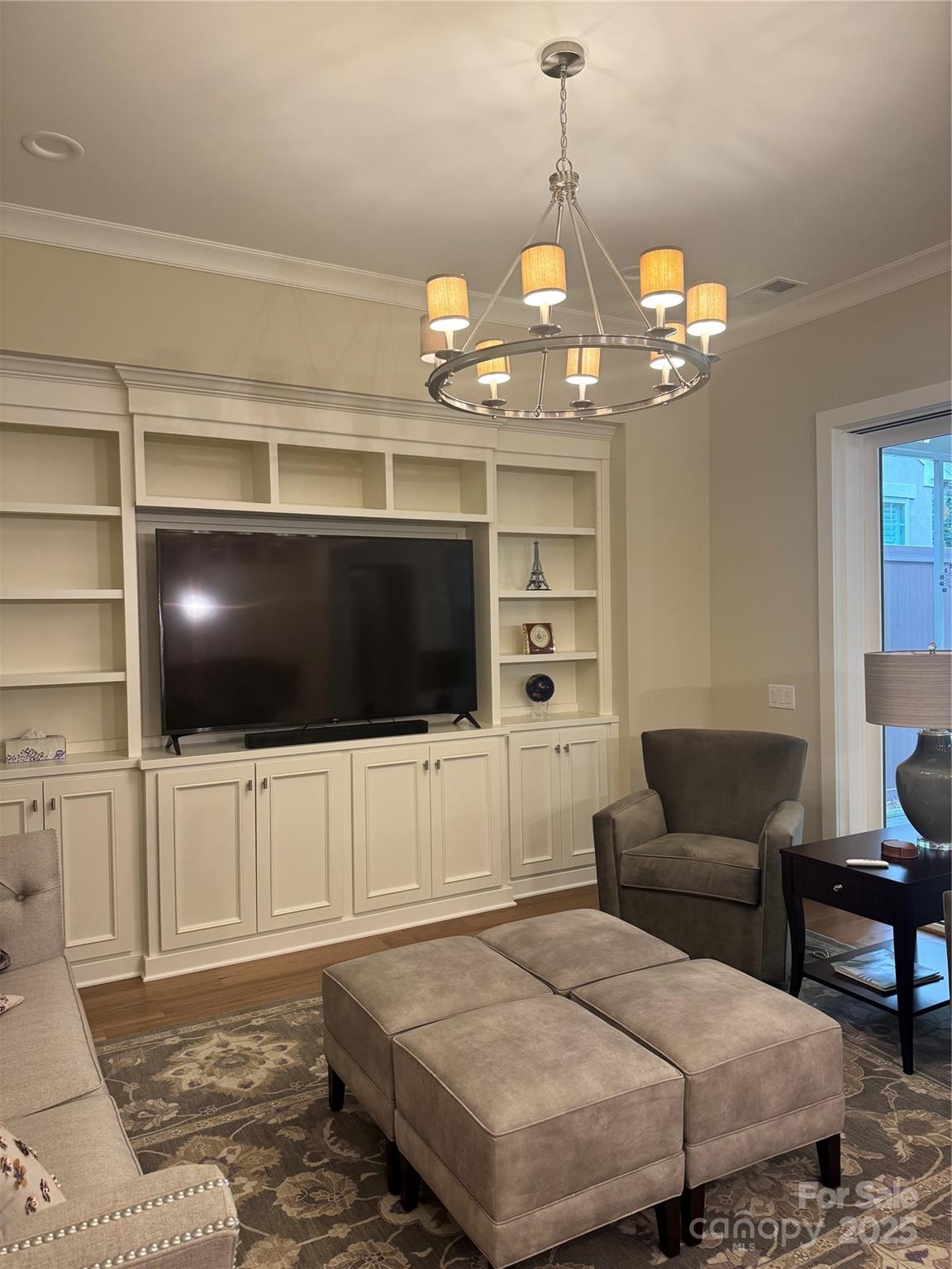 17728 Jetton Green Loop Cornelius, NC 28031 - Photo 6 of 7 a bedroom with a bed and a flat screen tv