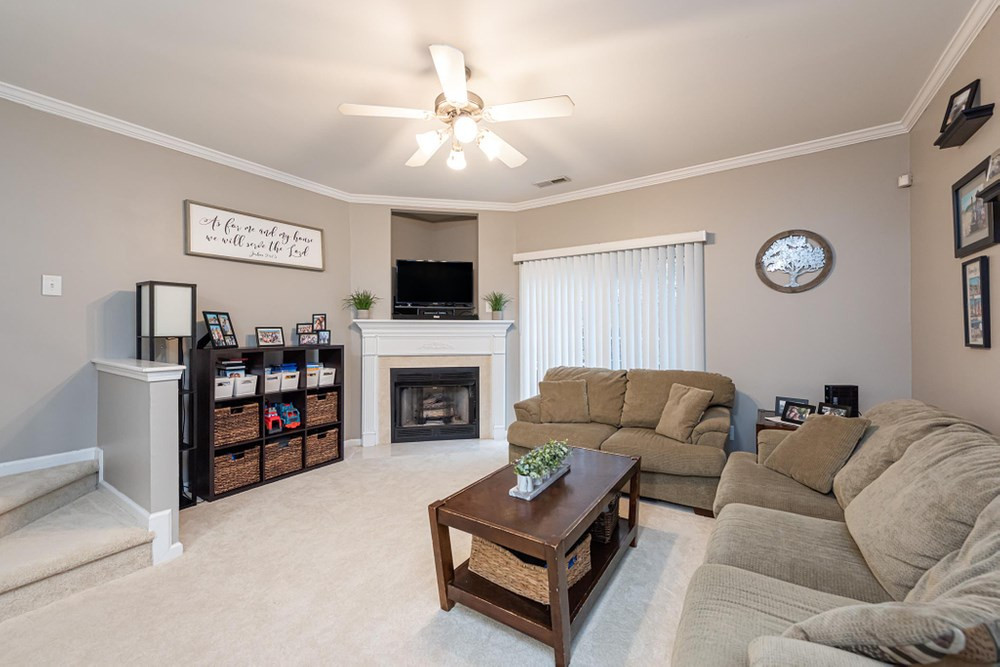 Beautiful gas log fireplace with enterntainment alcove above. Family Room