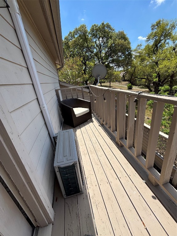 30 Oak Villa Road Canyon Lake, TX 78133 - Photo 23 of 29 a view of balcony with wooden floor and yard in the back