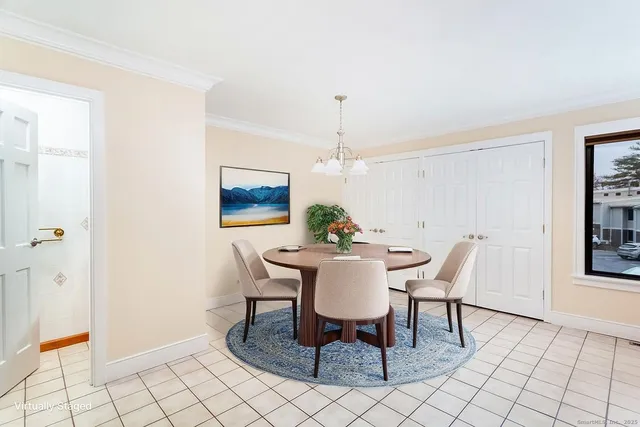 a view of a dining room with furniture