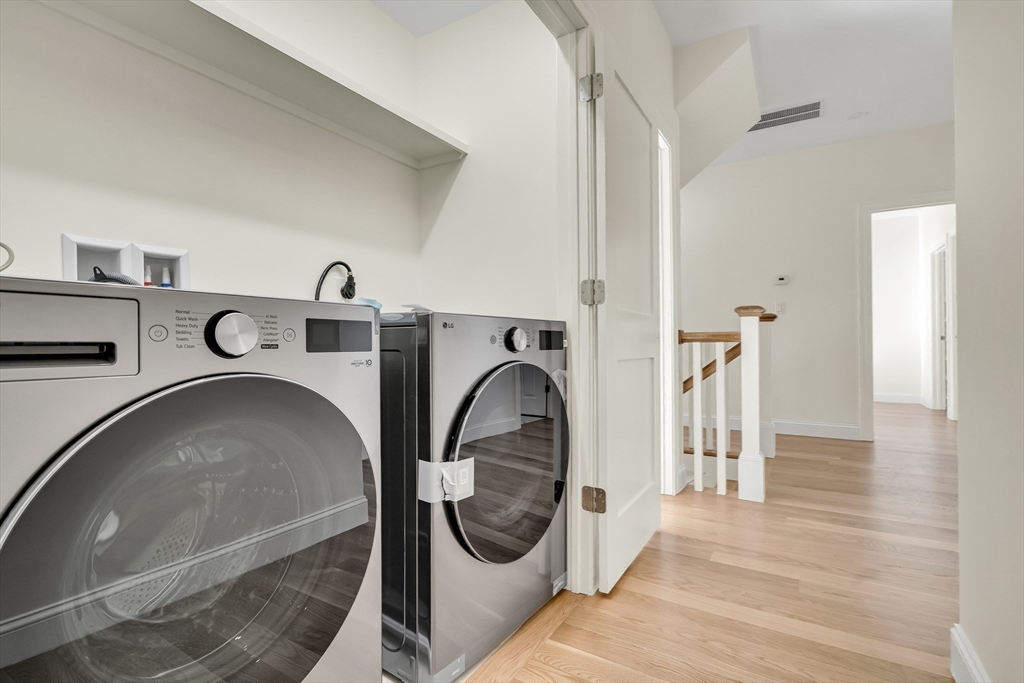 510 Common Street Walpole, MA 02081 - Photo 24 of 35 a utility room with dryer and washer
