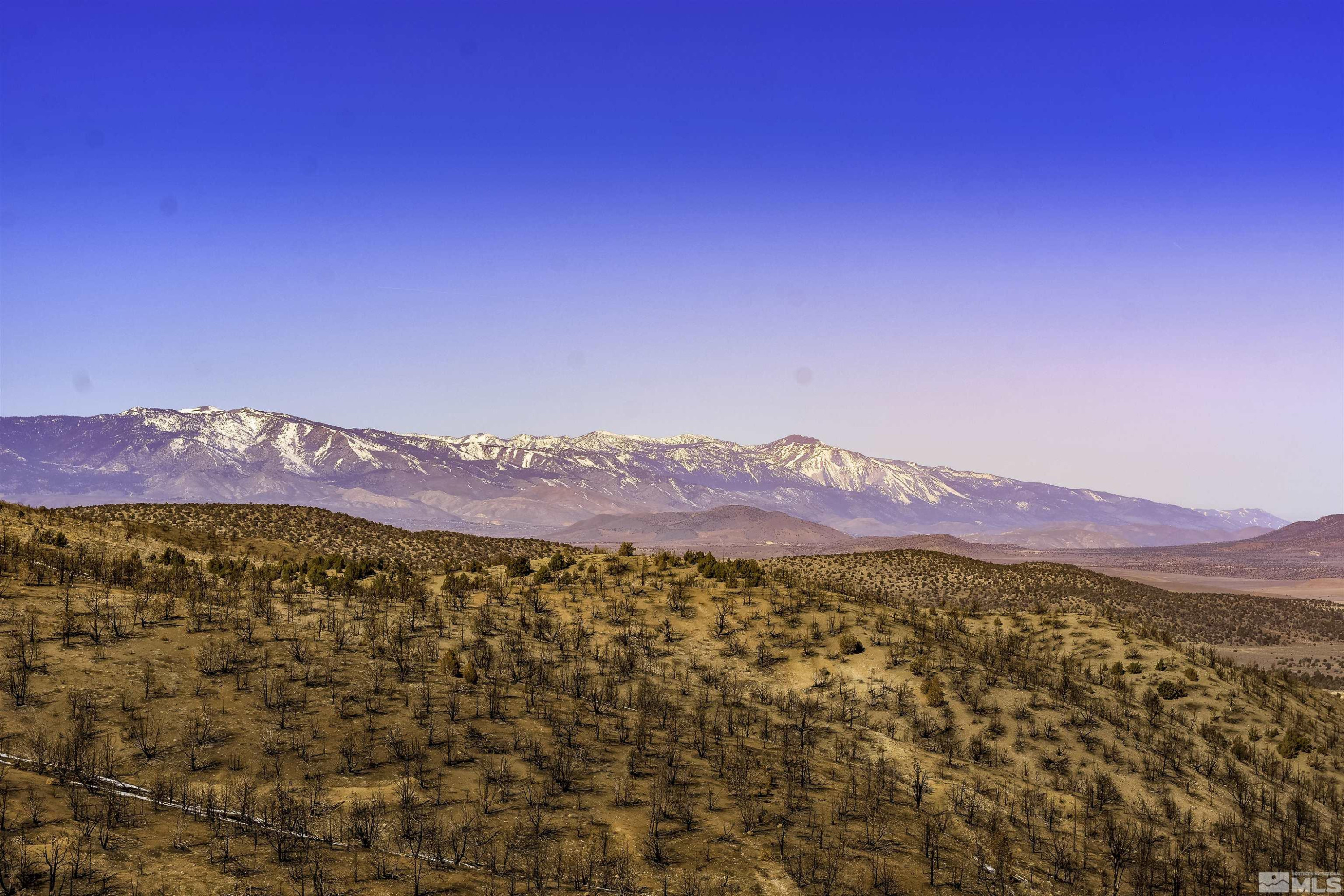 Tbd Tbd Parcels At Pine Gardnerville, NV 89410 - Photo 21 of 37 a view of mountain with sunset in background