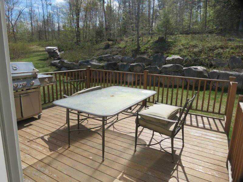 180 Edes Falls Road Naples, ME 04055 - Photo 27 of 30 Patio/Deck. Backyard deck