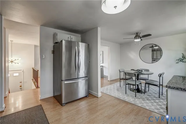 a view of a livingroom with furniture and entryway