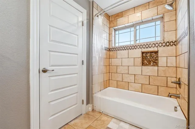 a bathroom with a bathtub