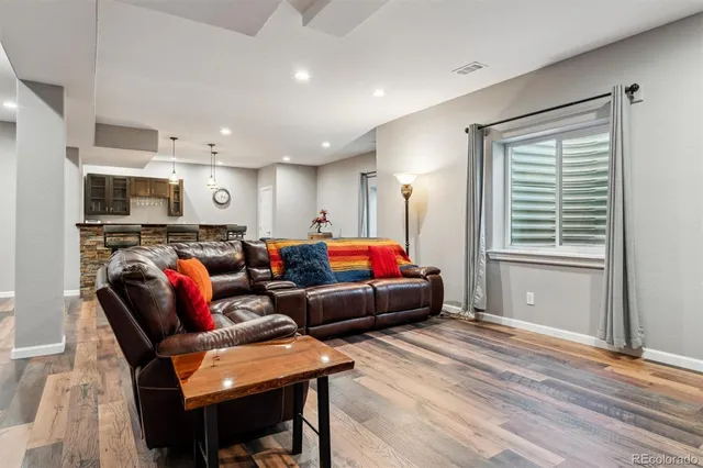 a living room with furniture and a window
