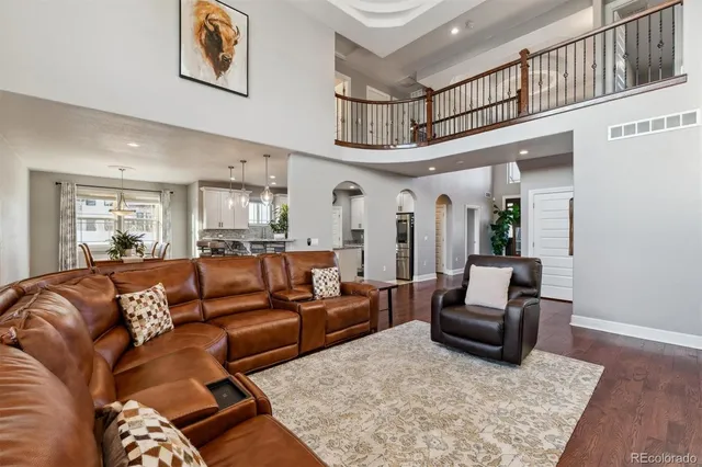 a living room with furniture or couch and a rug