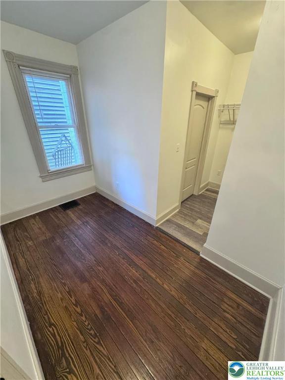1319 Northampton Street, Unit 1 Easton, PA 18042 - Photo 7 of 12 a view of an empty room with wooden floor and a window