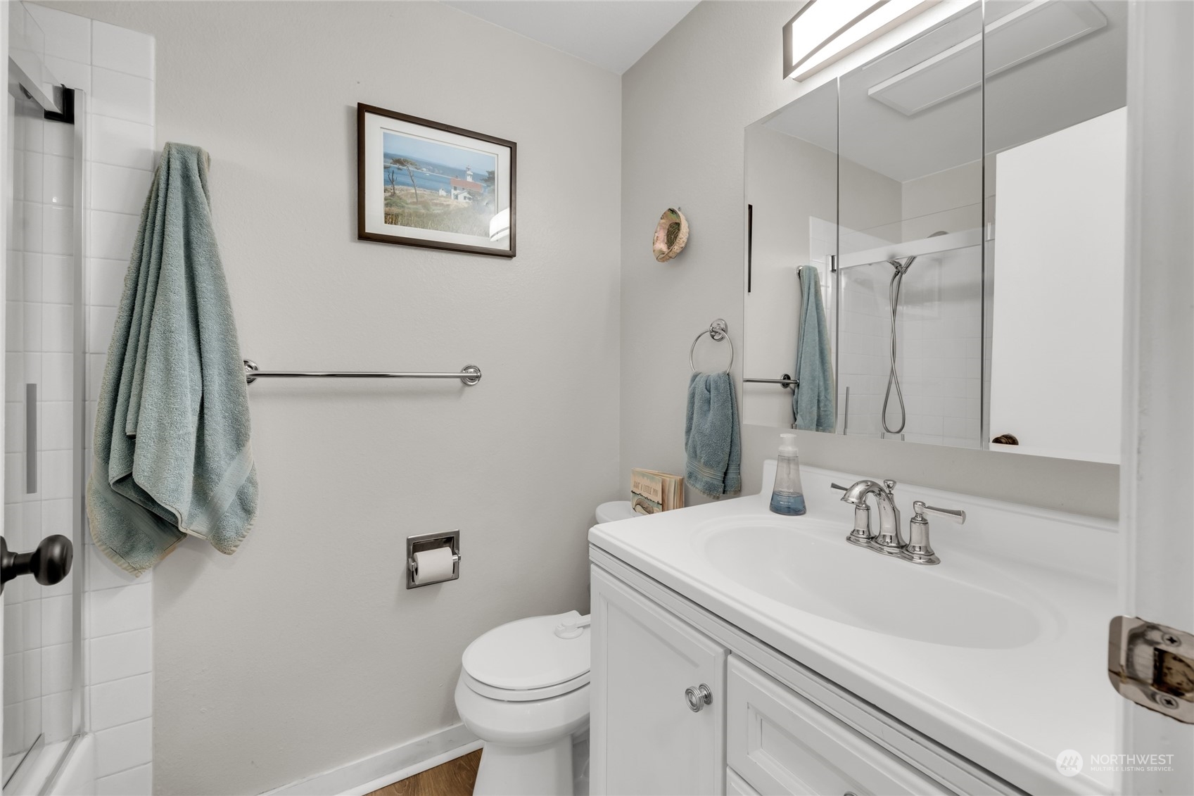424 214th Street Southwest, Unit 24B Bothell, WA 98021 - Photo 20 of 28 a bathroom with a sink and a mirror